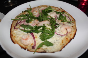 Braised shrimp on cheesy flat bread. A spectacular appetizer!!