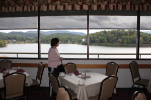 Barb looking out at the lake from the Terrace Dining Room where we took all our fine, buffet meals. The views made us hungry for more!