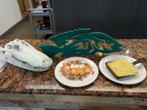 Lake Okeechobee themed Tin Fish offers spectacular salmon dishes and offers Jalapeno corn bread too! 