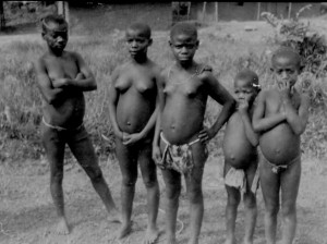Pygmies we met along the road in the Ituri Region of the Congo! Average life span there during our time travel through the region was 40-45!